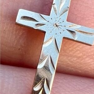 Solid 14k gold cross.
